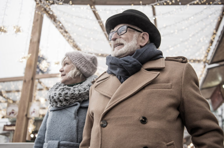Senior couple wearing jackets