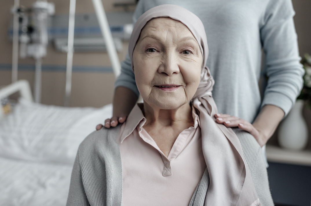 a hospital patient wearing a scarf